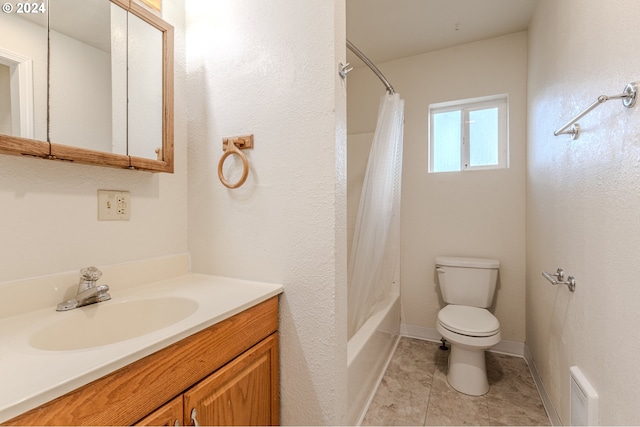 full bathroom with vanity, toilet, shower / bath combo, and tile patterned flooring