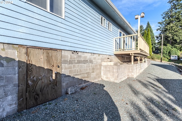 view of home's exterior with a deck