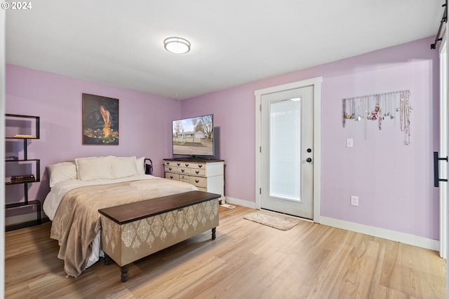 bedroom featuring light hardwood / wood-style floors