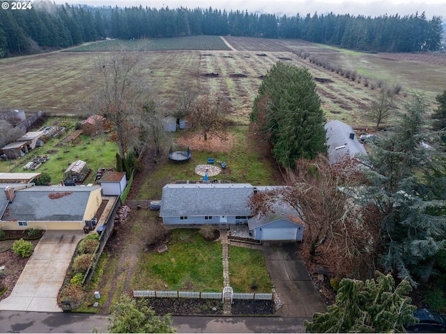 birds eye view of property featuring a rural view