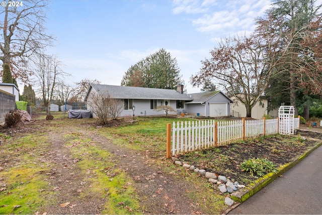 ranch-style home with a garage