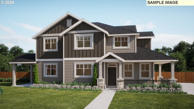 craftsman inspired home with covered porch and a front lawn