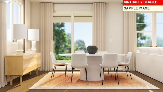 dining room featuring hardwood / wood-style flooring