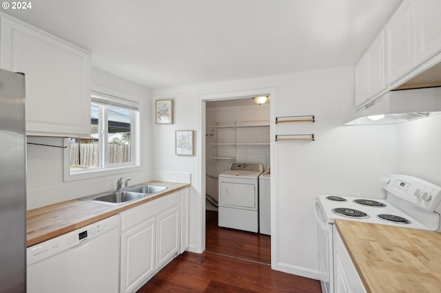 kitchen with white cabinets, white appliances, butcher block counters, dark hardwood / wood-style floors, and sink