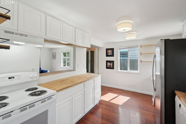 kitchen with white appliances, white cabinetry, dark hardwood / wood-style floors, and kitchen peninsula