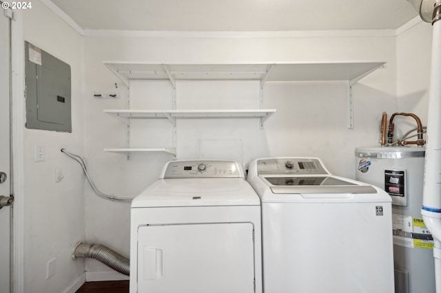 washroom with wood-type flooring, water heater, electric panel, and washing machine and dryer