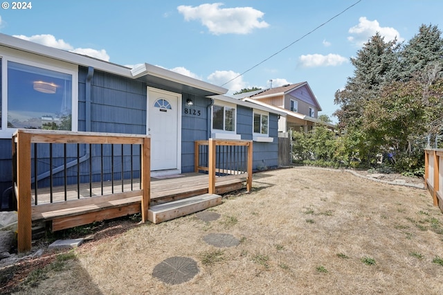 view of front facade with a deck