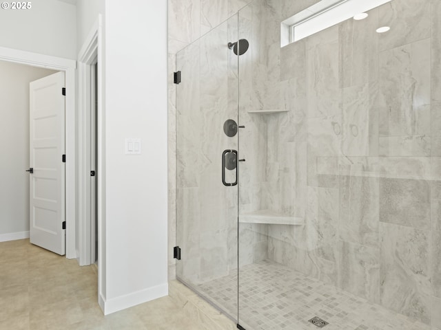 bathroom featuring an enclosed shower