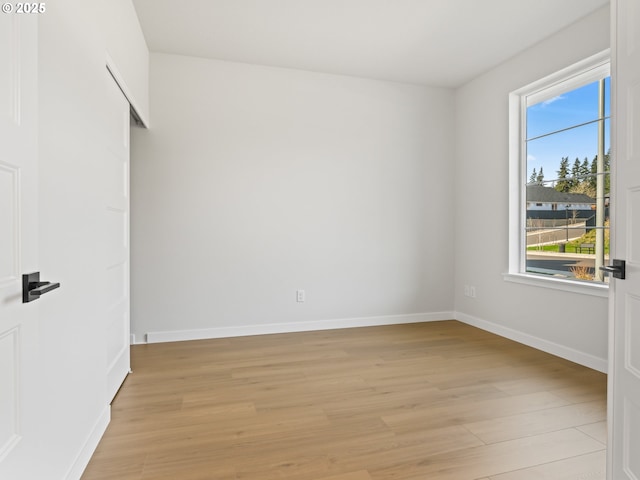 empty room featuring light hardwood / wood-style floors