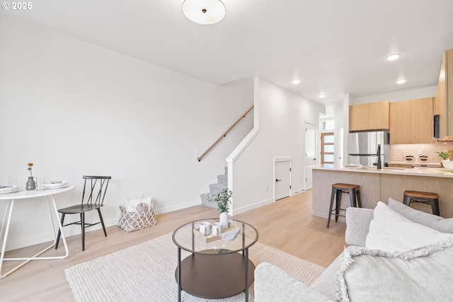 living room featuring light wood-type flooring