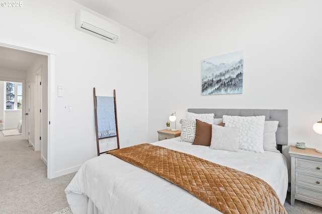 carpeted bedroom with a wall unit AC