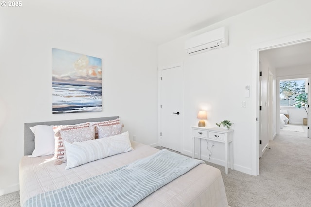 carpeted bedroom featuring a wall unit AC and a closet