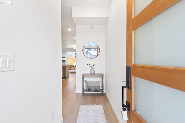 hall featuring light wood-type flooring