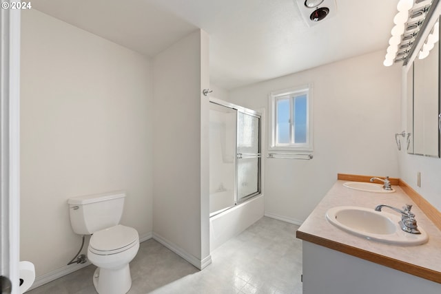 full bathroom with shower / bath combination with glass door, toilet, and vanity