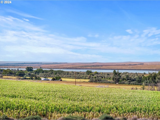 exterior space featuring a water view and a rural view