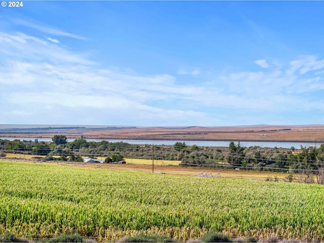 view of water feature with a rural view