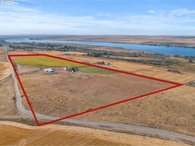 aerial view featuring a water view and a rural view