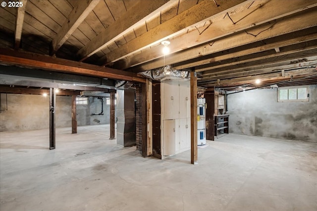 basement with strapped water heater