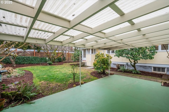 view of patio featuring fence and a pergola