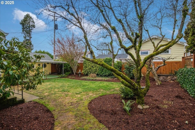 view of yard with fence