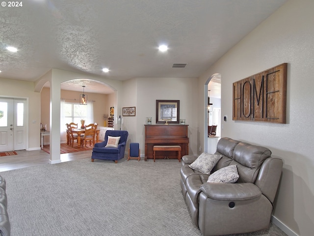 interior space with a textured ceiling