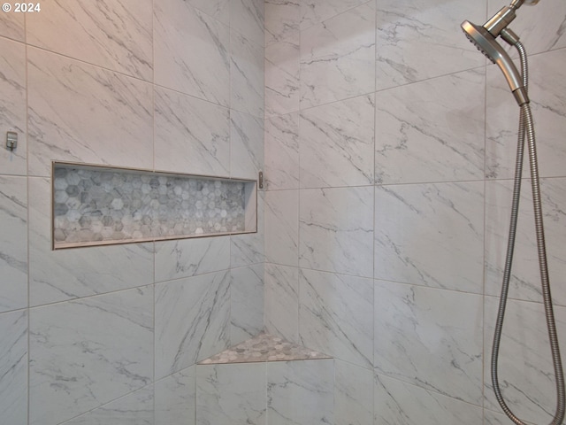 details with a tile shower