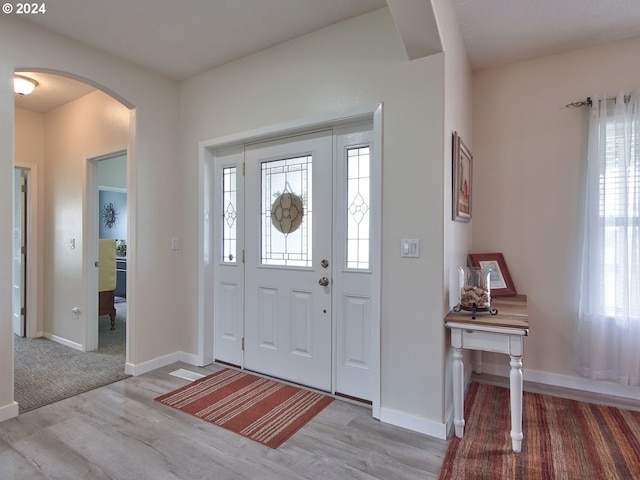 entryway featuring a healthy amount of sunlight and light wood-type flooring