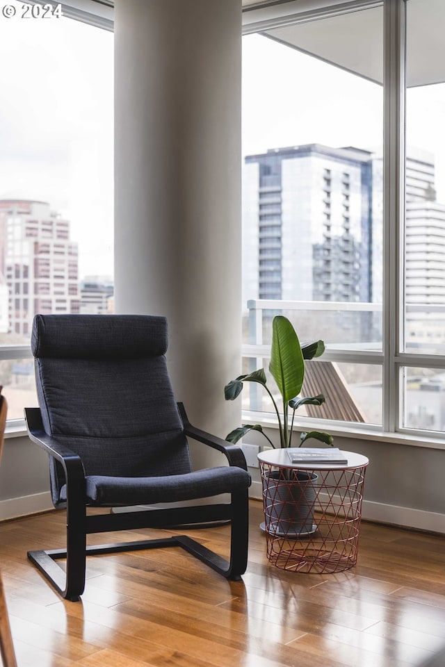 sitting room featuring hardwood / wood-style flooring