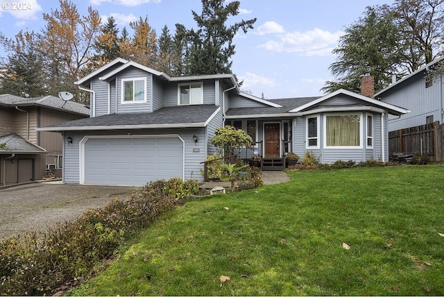 view of front facade featuring a garage and a front lawn