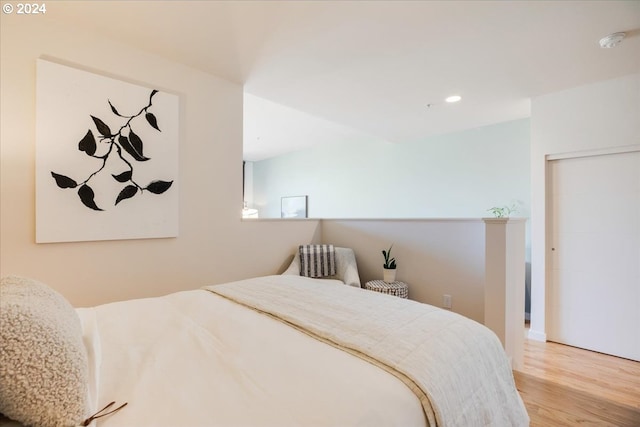 bedroom featuring light wood-type flooring