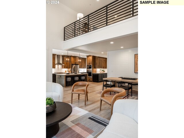 3600 N 11th Cir, Ridgefield, WA 98642 - living area featuring a high ceiling, light wood finished floors, and recessed lighting