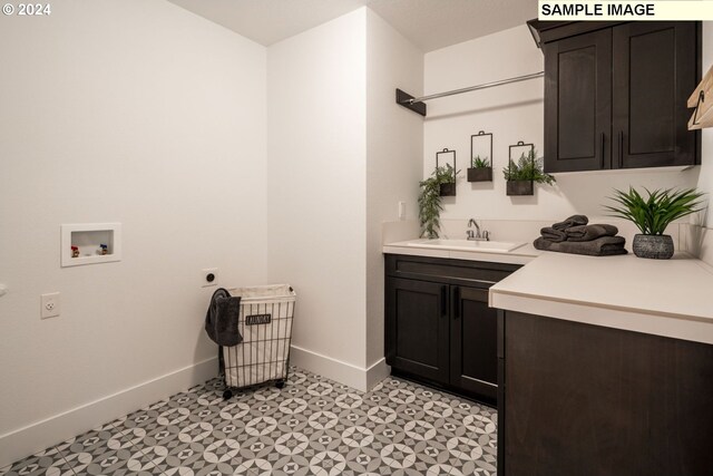 3600 N 11th Cir, Ridgefield, WA 98642 - washroom with washer hookup, cabinet space, light floors, and hookup for an electric dryer