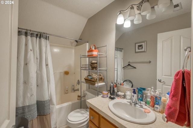 full bathroom featuring shower / tub combo, lofted ceiling, vanity, and toilet