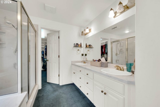 bathroom featuring vanity and walk in shower