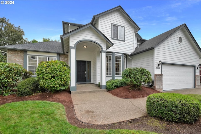 front facade with a garage