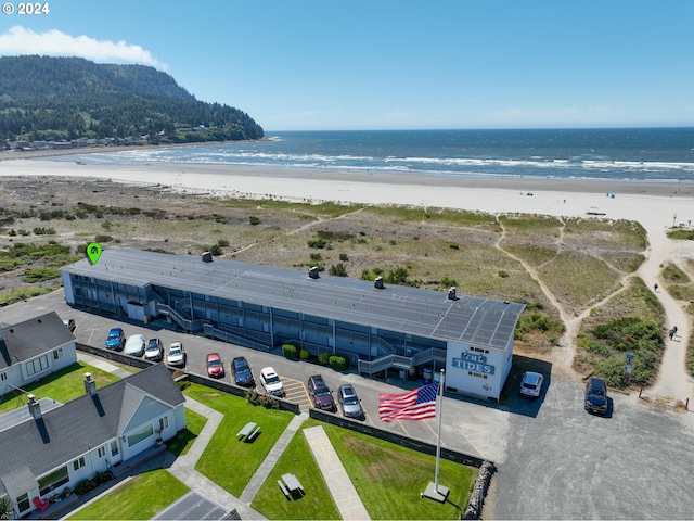 aerial view with a view of the beach and a water view