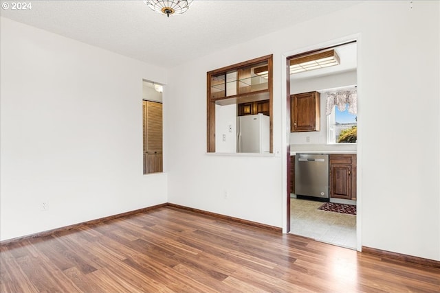 unfurnished living room with tile patterned floors