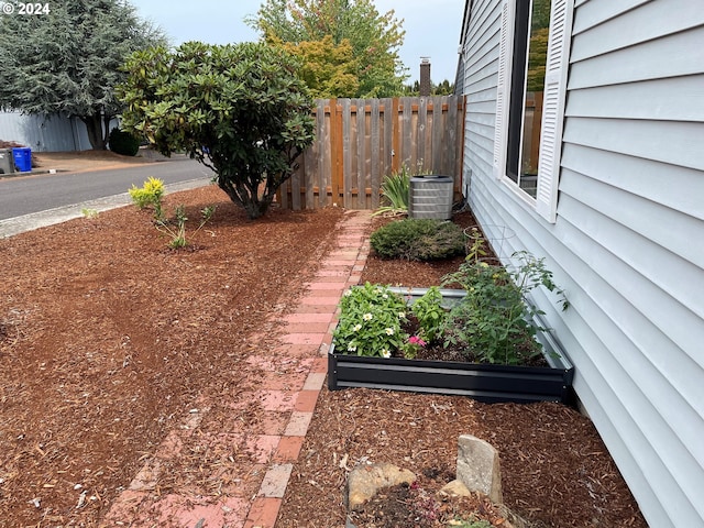 view of yard with central AC unit