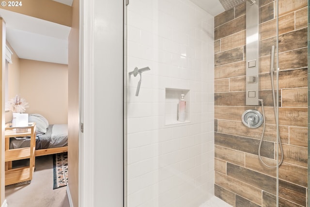 bathroom with tiled shower and ensuite bath