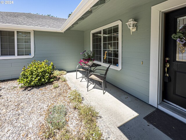 property entrance with a patio