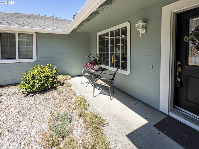 entrance to property with a patio area