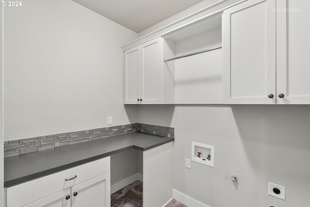 laundry area with cabinets, electric dryer hookup, hookup for a washing machine, and gas dryer hookup