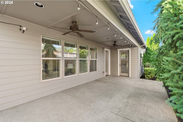 view of patio / terrace featuring ceiling fan