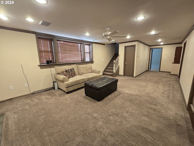 unfurnished living room featuring ceiling fan, ornamental molding, and light carpet