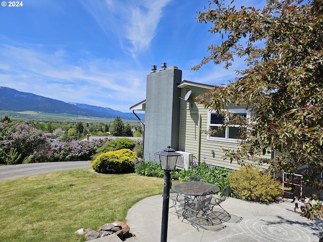 exterior space featuring a mountain view