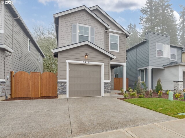 craftsman-style house with a garage