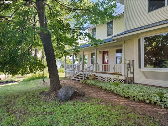 exterior space featuring covered porch