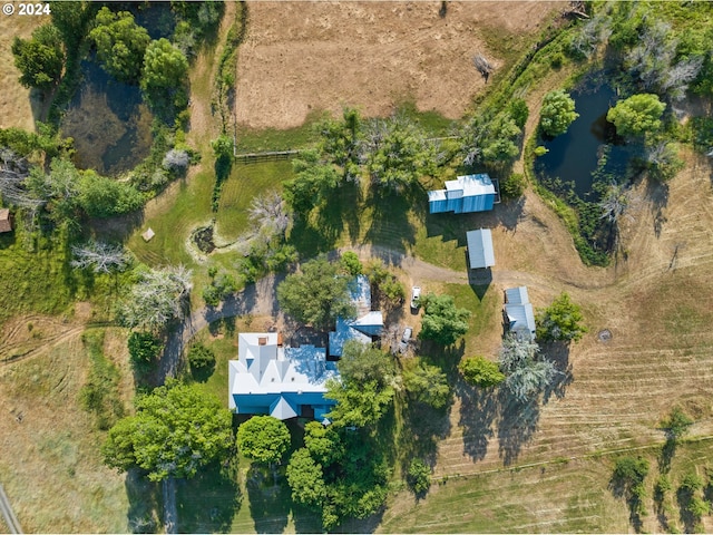 bird's eye view featuring a water view and a rural view