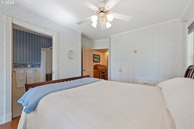 bedroom featuring crown molding, hardwood / wood-style floors, and ceiling fan