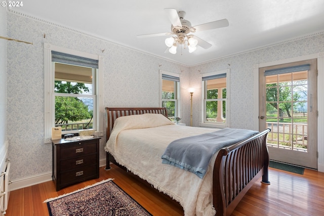 bedroom with access to exterior, light hardwood / wood-style flooring, ornamental molding, and ceiling fan